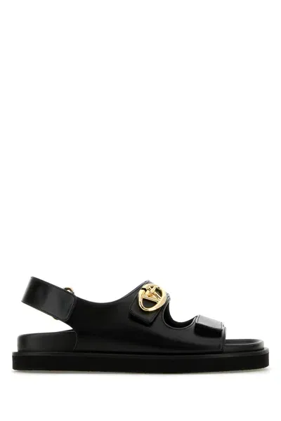 Valentino Garavani 'vlogo Locker' Flat Sandals With Gold-tone Hardware In Black