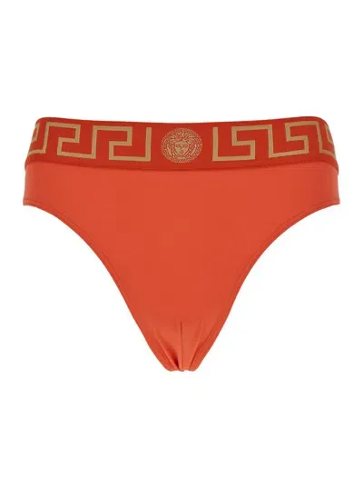 Versace Greca Border Stretched Swim Shorts In Orange