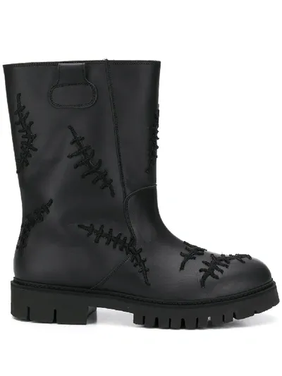 Moschino Scars Boots In Black