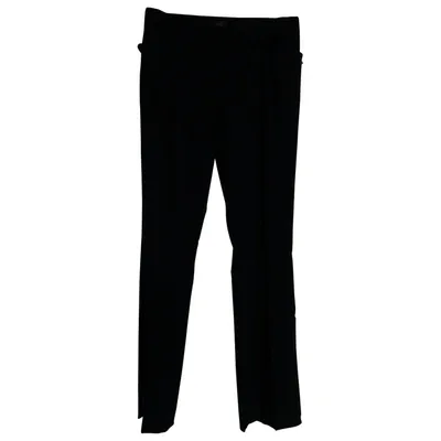 Pre-owned John Richmond Wool Trousers In Black